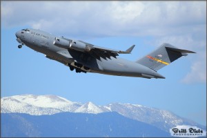 A C-17A Globemaster III raises into the air at the 2010 March ARB Airshow