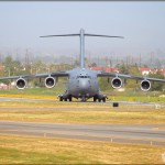 The C-17A Globemaster III backs into position on the runway at Riverside Airport