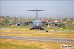 The C-17A Globemaster III backs into position on the runway at Riverside Airport