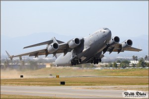 A C-17 Globemaster III raises up into the skies at the 2010 Riverside Airshow