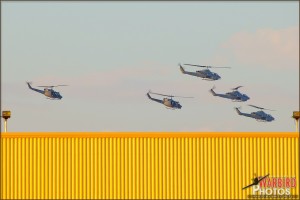 AH-1W Cobras lead in UH-1N Hueys at MCAS Miramar