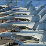F/A-18E and F model Super Hornets sit on the flight deck of the USS Abraham Lincoln Aircraft Carrier