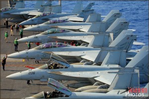 F/A-18E and F model Super Hornets sit on the flight deck of the USS Abraham Lincoln Aircraft Carrier