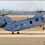 A Ch-46E Sea Knight carrying troops makes a rapid landing during the Marine Air Ground Task Force at the 2011 MCAS Miramar Airshow