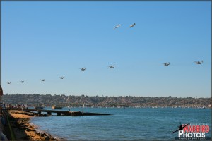 Marine CH-53 Super Stallions and C-130K Hercules pass in review for the Centennial of Naval Aviation Celebration 2011