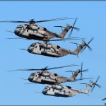 Four of the eight Marine CH-53E Super Stallion helicopters pass in review at the Centennial of Naval Aviation Celebration 2011