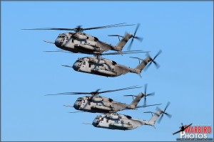 Four of the eight Marine CH-53E Super Stallion helicopters pass in review at the Centennial of Naval Aviation Celebration 2011