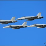Four US Navy F/A-18E Super Hornets pass in formation at the Centennial of Naval Aviation Celebration 2011