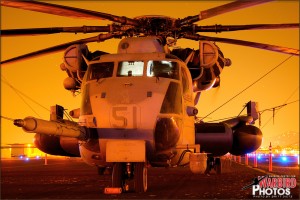 A Sikorsky CH-53E Super Stallion sits at night at the Gillespie Field Airport