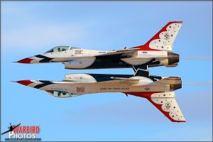 The two USAF Thunderbird solos pass in a tight inverted formation at the Nellis AFB Airshow 2011