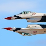 The two USAF Thunderbird solos pass in a tight inverted formation at the Nellis AFB Airshow 2011